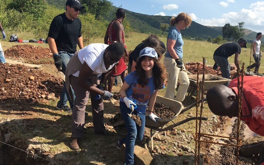 Hannah Alper helps build a new high school in Kenya as part of a service trip with the organization Me to We, in June 2016. (Courtesy)