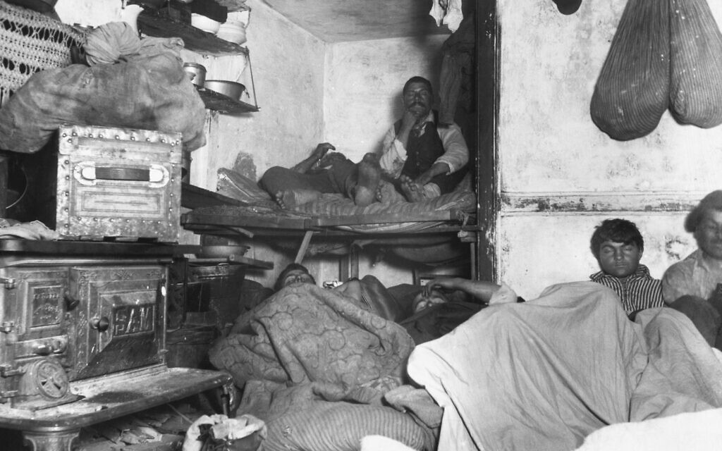 Illustrative photo of immigrants in a New York tenement. (Bettmann/Getty Images)