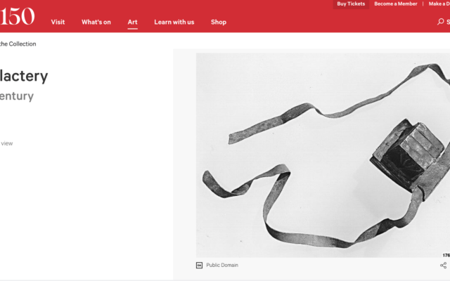 Screen shot of the Metropolitan Museum of Art website with a revised description replaceing the word 'amulet' with 'phylactery' for an antique set of tefillin. (Screenshot via JTA)