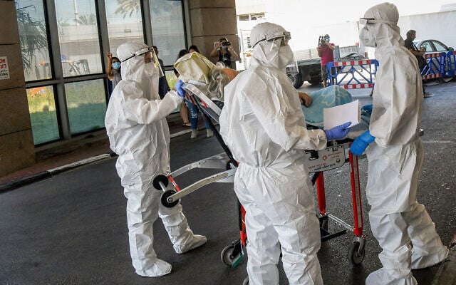 Magen David Adom evacuates a patient at the Sheba Medical Center in Ramat Gan, July 8, 2020. (Flash90) Magen David Adom evacuates a patient at the Sheba Medical Center in Ramat Gan, July 8, 2020. (Flash90)