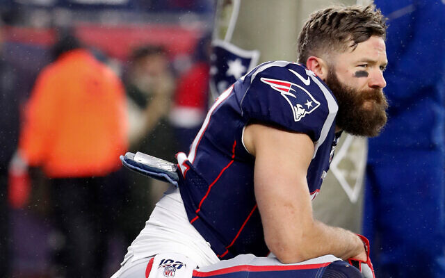 New England Patriots' Julian Edelman before an NFL football game against the Dallas Cowboys at Gillette Stadium in Foxborough, Massachusetts, November 24, 2019. (Winslow Townson/AP Images for Panini) New England Patriots' Julian Edelman before an NFL football game against the Dallas Cowboys at Gillette Stadium in Foxborough, Massachusetts, November 24, 2019. (Winslow Townson/AP Images for Panini)