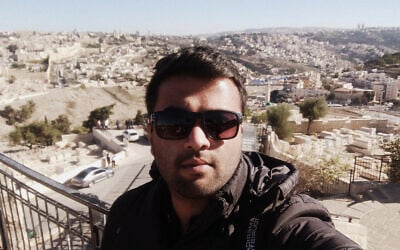 Siva Sai, who works and studies at Tel Aviv University's Sackler School of Medicine, during a visit to Har Zion. Sai is currently stuck in India because of the coronavirus pandemic. (Courtesy/Sai via JTA)