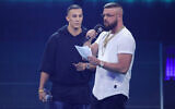 Rappers Farid Bang, left, and Kollegah, right, speak on stage during the Echo Award show at Messe Berlin on April 12, 2018 in Berlin, Germany. (Photo by Andreas Rentz/Getty Images)