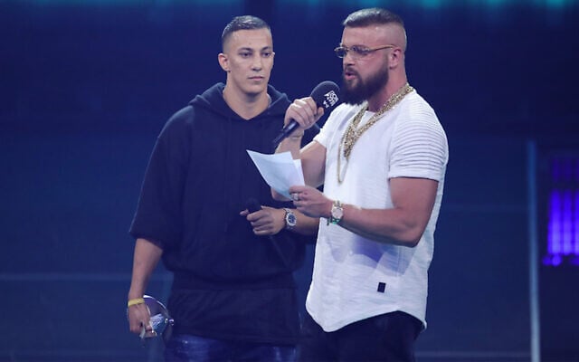 Rappers Farid Bang, left, and Kollegah, right, speak on stage during the Echo Award show at Messe Berlin on April 12, 2018 in Berlin, Germany. (Photo by Andreas Rentz/Getty Images) Rappers Farid Bang, left, and Kollegah, right, speak on stage during the Echo Award show at Messe Berlin on April 12, 2018 in Berlin, Germany. (Photo by Andreas Rentz/Getty Images)
