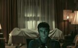 A still from "The Vigil" shows the horror movie's main character sitting guard over the body of a Holocaust survivor. (Vertigo Releasing)