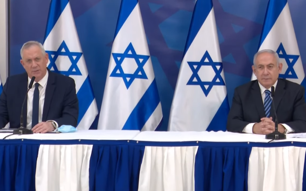Defense Minister Benny Gantz (left) and Prime Minister Benjamin Netanyahu at a press briefing following an incident on the Israel-Lebanon border in which Israel said it thwarted a Hezbollah attack, July 27, 2020 (screenshot) Defense Minister Benny Gantz (left) and Prime Minister Benjamin Netanyahu at a press briefing following an incident on the Israel-Lebanon border in which Israel said it thwarted a Hezbollah attack, July 27, 2020 (screenshot)