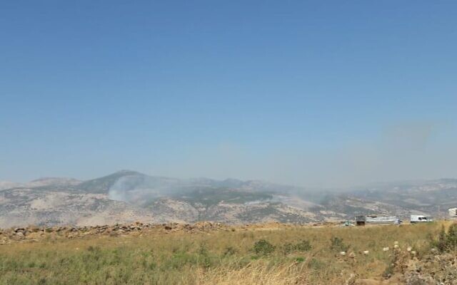 Smoke rises from a fire sparked by Israel near the contested Mount Dov area, along the Israel-Lebanon border on July 22, 2020. (Hezbollah media)