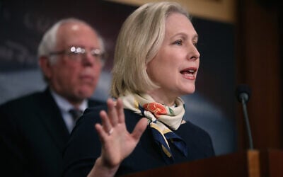 US Sen. Kirsten Gillibrand (R) speaks as Sen. Bernie Sanders (L) looks on during a news conference at the US Capitol on March 14, 2017 in Washington, DC. (Justin Sullivan/Getty Images)