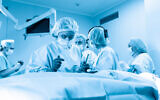 Doctors try to save a patient from pneumonia of the virus COVID-19 (iStock)