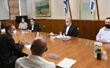 Then-Prime Minister Benjamin Netanyahu (center) and Finance Minister Israel Katz (right) meet with representatives of self-employed Israelis and small business owners at the Prime Minister's Office in Jerusalem, July 10, 2020. (PMO)