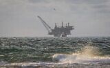 A view of the Leviathan natural gas processing rig from Dor Habonim Beach Nature Reserve, on January 1, 2020. (Flash90)