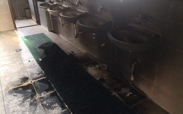 Charred sinks in an el-Bireh mosque that was torched overnight July 27, 2020, in an apparent hate attack by extremist Jews (Iyad Hadad/B'Tselem) Charred sinks in an el-Bireh mosque that was torched overnight July 27, 2020, in an apparent hate attack by extremist Jews (Iyad Hadad/B'Tselem)
