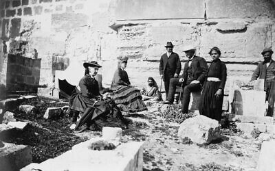 Illustrative: A group of tourists with residents of Jerusalem, circa 1860-1880. (Library of Congress)