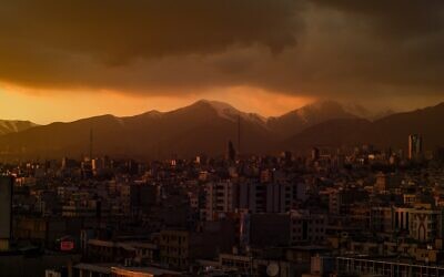 Illustrative: A view of Tehran at dusk. (Omid Armin on Unsplash)