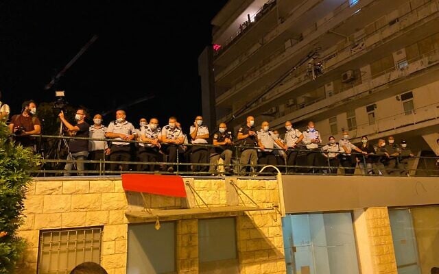 Police observing dispersal of anti-Netanyahu protesters early morning on Sunday, July 26, 2020 (Anat Peled/Times of Israel) Police observing dispersal of anti-Netanyahu protesters early morning on Sunday, July 26, 2020 (Anat Peled/Times of Israel)