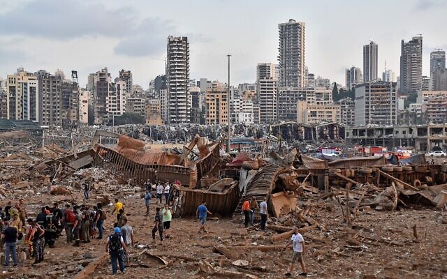 A picture shows the scene of an explosion near the the port in the Lebanese capital Beirut on August 4, 2020. (by STR / AFP) A picture shows the scene of an explosion near the the port in the Lebanese capital Beirut on August 4, 2020. (by STR / AFP)