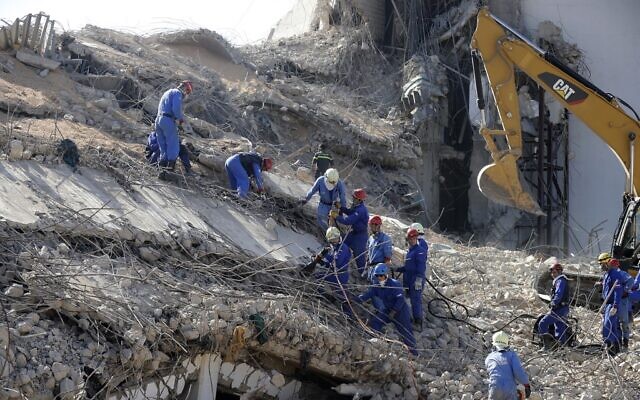 Russian rescue teams search for survivors at Beirut port on August 7, 2020, three days after a massive blast there shook the Lebanese capital. (Photo by JOSEPH EID / AFP) Russian rescue teams search for survivors at Beirut port on August 7, 2020, three days after a massive blast there shook the Lebanese capital. (Photo by JOSEPH EID / AFP)