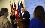 US Secretary of State Mike Pompeo is flanked by US Ambassador to the United Nations Kelly Craft as he speaks to reporters following a meeting with members of the UN Security Council about Iran's alleged non-compliance with a nuclear deal and calling for the restoration of sanctions against Iran at United Nations headquarters in New York, August 20, 2020. (MIKE SEGAR / POOL / AFP)