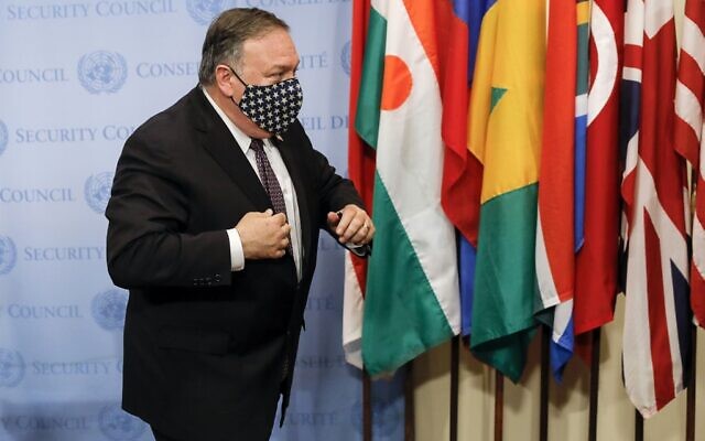 US Secretary of State Mike Pompeo wears a facemask as he departs after speaking to reporters following a meeting with members of the UN Security Council about Iran's alleged non-compliance with a nuclear deal and calling for the restoration of sanctions against Iran at United Nations headquarters in New York, August 20, 2020. (MIKE SEGAR / POOL / AFP) US Secretary of State Mike Pompeo wears a facemask as he departs after speaking to reporters following a meeting with members of the UN Security Council about Iran's alleged non-compliance with a nuclear deal and calling for the restoration of sanctions against Iran at United Nations headquarters in New York, August 20, 2020. (MIKE SEGAR / POOL / AFP)