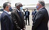 US Secretary of State Mike Pompeo (R) is welcomed by a Sudanese official in Khartoum on August 25, 2020. (AFP)