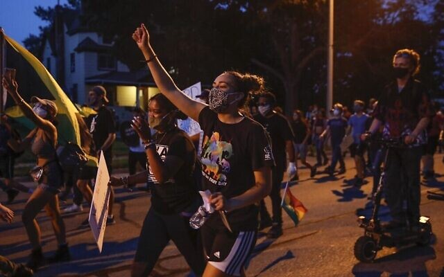 Protesters march during a demonstration against the police shooting of Jacob Blake in Kenosha, Wisconsin, on August 26, 2020. (Kamil Krzaczynski/AFP) Protesters march during a demonstration against the police shooting of Jacob Blake in Kenosha, Wisconsin, on August 26, 2020. (Kamil Krzaczynski/AFP)