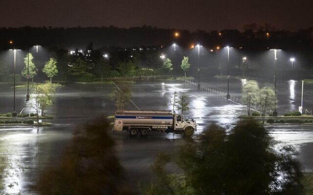 A single truck is parked in an open lot as heavy rains from hurricane Laura fall in Lake Charles, Louisiana, on August 26, 2020. (Andrew Caballero-Reynolds/AFP) A single truck is parked in an open lot as heavy rains from hurricane Laura fall in Lake Charles, Louisiana, on August 26, 2020. (Andrew Caballero-Reynolds/AFP)