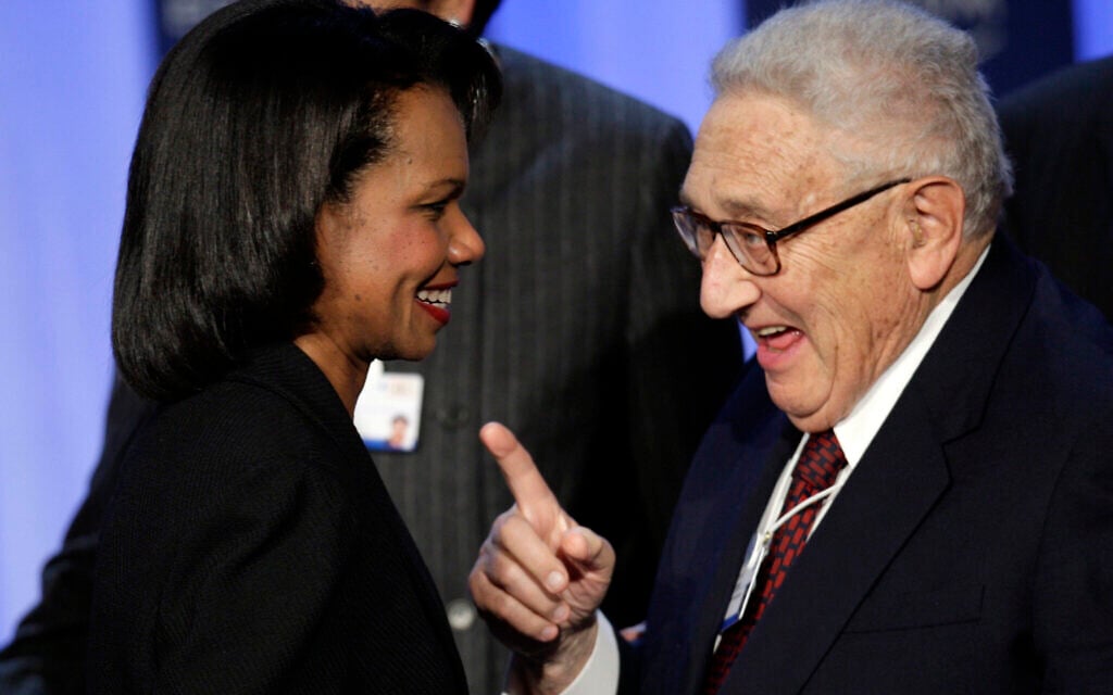 US Secretary of State Condoleezza Rice, left, speaks former secretary of state Henry Kissinger after the opening plenary session on the first day of the Annual Meeting of the World Economic Forum, WEF, in Davos, Switzerland, January 23, 2008. (AP Photo/Keystone, Laurent Gillieron)
