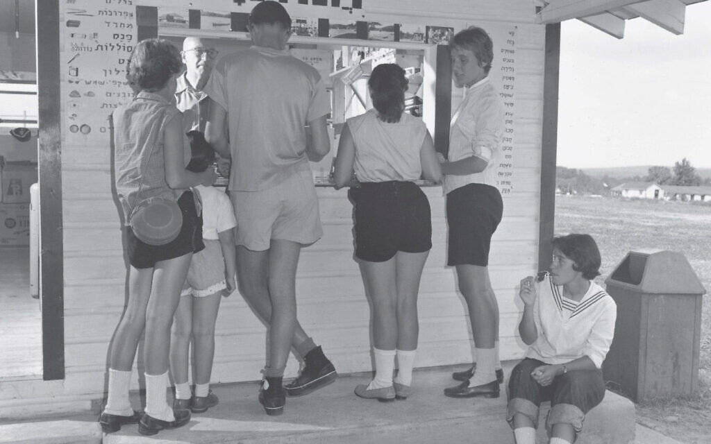 Hebrew was the public language of Camp Ramah in the 1950s, with many words borrowed from the Massad lexicon, including the term 'Chanutiya' (canteen) above the take-out window in this image. Note that the menu item are described with drawings rather than translated into English. (National Ramah Commission)