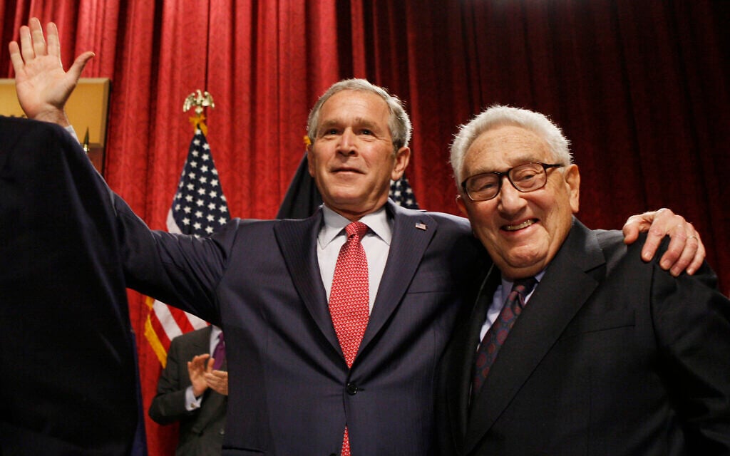 Former secretary of state Henry Kissinger with then-president George W. Bush in New York City, March 14, 2008.  (AP Photo/Charles Dharapak)