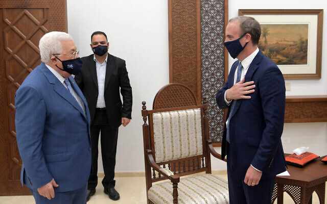 British Foreign Secretary Dominic Raab (right) meets with Palestinian Authority President Mahmoud Abbas in Ramallah, the West Bank, August 25, 2020 (WAFA) British Foreign Secretary Dominic Raab (right) meets with Palestinian Authority President Mahmoud Abbas in Ramallah, the West Bank, August 25, 2020 (WAFA)