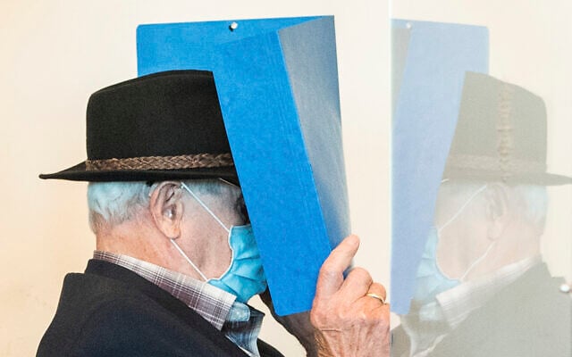 A 93-year-old former SS guard of the Stutthof concentration camp near Danzig in Poland is pushed into a courtroom in the regional court in Hamburg, Germany, July 23, 2020. (Daniel Bockwoldt/dpa via AP) A 93-year-old former SS guard of the Stutthof concentration camp near Danzig in Poland is pushed into a courtroom in the regional court in Hamburg, Germany, July 23, 2020. (Daniel Bockwoldt/dpa via AP)
