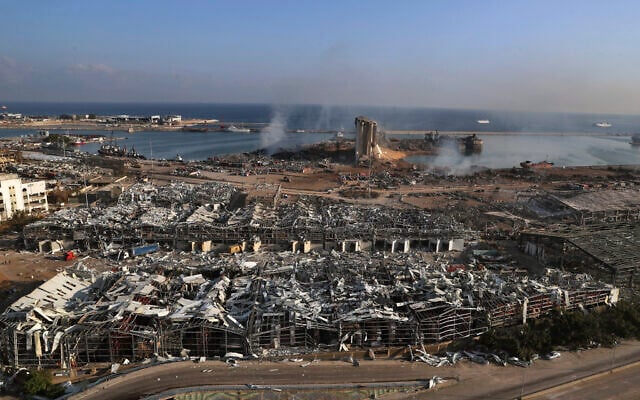 A general view of the scene the day after an explosion hit the seaport of Beirut, Lebanon, August 5, 2020. (Bilal Hussein/AP) A general view of the scene the day after an explosion hit the seaport of Beirut, Lebanon, August 5, 2020. (Bilal Hussein/AP)