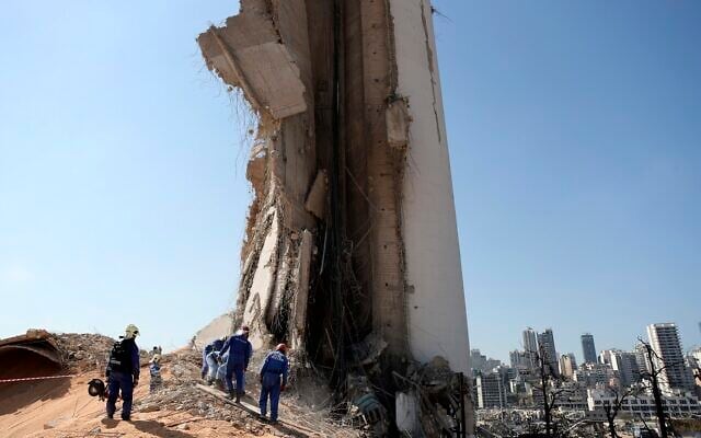 A rescue team surveys the scene of this week's massive explosion in the port of Beirut, Lebanon, Friday, Aug. 7, 2020 (AP Photo/Thibault Camus) A rescue team surveys the scene of this week's massive explosion in the port of Beirut, Lebanon, Friday, Aug. 7, 2020 (AP Photo/Thibault Camus)