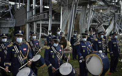 A scouts band performs in honor of the victims of the Beirut blast, in Beirut, Lebanon on August 11, 2020. (AP/Felipe Dana) A scouts band performs in honor of the victims of the Beirut blast, in Beirut, Lebanon on August 11, 2020. (AP/Felipe Dana)