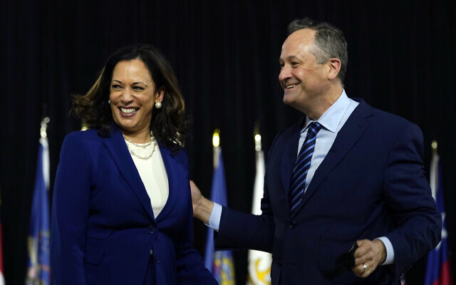 Sen. Kamala Harris, D-Calif., and her husband Douglas Emhoff look over to Democratic presidential candidate former Vice President Joe Biden and his wife Jill Biden after a campaign event at Alexis Dupont High School in Wilmington, Del., Wednesday, Aug. 12, 2020. (AP Photo/Carolyn Kaster) Sen. Kamala Harris, D-Calif., and her husband Douglas Emhoff look over to Democratic presidential candidate former Vice President Joe Biden and his wife Jill Biden after a campaign event at Alexis Dupont High School in Wilmington, Del., Wednesday, Aug. 12, 2020. (AP Photo/Carolyn Kaster)