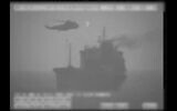 Iranian commandos fast-rope down from a helicopter onto the MV Wila oil tanker in the Gulf of Oman off the coast of the United Arab Emirates, August 12, 2020. (US military's Central Command via AP)