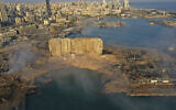 Smoke rises from the scene of the explosion in the seaport of Beirut, Lebanon, August 5, 2020. (AP/Hussein Malla, File)