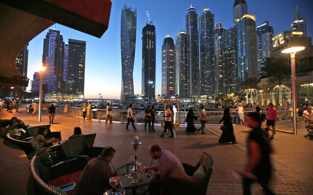 Two men play backgammon while smoking a shisha water pipe at a restaurant overlooking the canal and the Dubai Marina neighborhood in Dubai, United Arab Emirates, on May 1, 2015. (AP Photo/Kamran Jebreili, File) Two men play backgammon while smoking a shisha water pipe at a restaurant overlooking the canal and the Dubai Marina neighborhood in Dubai, United Arab Emirates, on May 1, 2015. (AP Photo/Kamran Jebreili, File)