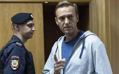Russian opposition leader Alexei Navalny gestures while speaking in a court room in Moscow, Russia, August 27, 2018. (AP Photo/Pavel Golovkin, File)