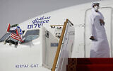 An official stands at the door of an Israeli El Al airliner after it landed in Abu Dhabi, United Arab Emirates, August 31, 2020. (Nir Elias/Pool Photo via AP)