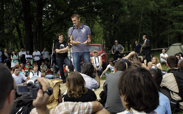 Alexei Navalny, center, delivers his speech at a summer camp organized by Kremlin critics in the Khimki forest, outside Khimki, Russia, Saturday, June 18, 2011. (AP/Sergey Ponomarev) Alexei Navalny, center, delivers his speech at a summer camp organized by Kremlin critics in the Khimki forest, outside Khimki, Russia, Saturday, June 18, 2011. (AP/Sergey Ponomarev)