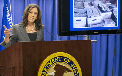 California Attorney Kamala Harris takes questions from the media a raid early in the day in downtown Los Angeles, Wednesday, Sept. 10, 2014. (AP Photo/Damian Dovarganes)
