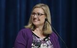 Then-mayoral candidate Kate Gallego pauses before answering a question during a mayoral debate at Phoenix College Thursday, September 27, 2018, in Phoenix. (AP Photo/Ross D. Franklin)