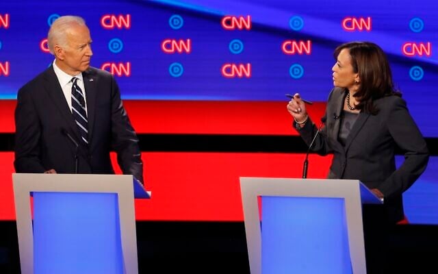 Former US vice president Joe Biden listens as California Senator Kamala Harris speaks during a Democratic presidential primary debate hosted by CNN, July 31, 2019, in the Fox Theatre in Detroit. (AP Photo/Paul Sancya) Former US vice president Joe Biden listens as California Senator Kamala Harris speaks during a Democratic presidential primary debate hosted by CNN, July 31, 2019, in the Fox Theatre in Detroit. (AP Photo/Paul Sancya)