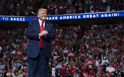 In this June 20, 2020, file photo US President Donald Trump arrives on stage to speak at a campaign rally at the BOK Center in Tulsa, Oklahoma (AP Photo/Evan Vucci, File)
