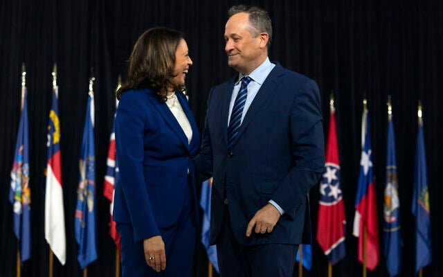 Democratic presidential candidate former Vice President Joe Biden's running mate Sen. Kamala Harris, D-Calif., and her husband Douglas Emhoff look to each other at the end of a campaign event at Alexis Dupont High School in Wilmington, Del., Wednesday, Aug. 12, 2020. (AP Photo/Carolyn Kaster) Democratic presidential candidate former Vice President Joe Biden's running mate Sen. Kamala Harris, D-Calif., and her husband Douglas Emhoff look to each other at the end of a campaign event at Alexis Dupont High School in Wilmington, Del., Wednesday, Aug. 12, 2020. (AP Photo/Carolyn Kaster)