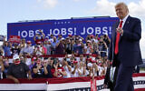 US President Donald Trump arrives to speak at a campaign rally at Wittman Airport, Monday, Aug. 17, 2020, in Oshkosh, Wisconsin (AP Photo/Evan Vucci)