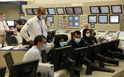 In this undated photograph published by the United Arab Emirates' state-run WAM news agency, employees work at the Barakah Nuclear Power Plant in the UAE's far western desert (WAM via AP)