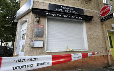 Exterior view of the burnt out bar 'Morgen Wird Besser' (Tomorrow will be better) pictured in Berlin, Germany, Aug. 19, 2020. (AP Photo/Michael Sohn)