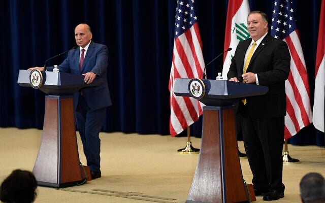 US Secretary of State Mike Pompeo, right, speaks during a news conference with Iraqi Foreign Minister Fuad Hussein, left, at the State Department in Washington, August 19, 2020. (Susan Walsh/AP) US Secretary of State Mike Pompeo, right, speaks during a news conference with Iraqi Foreign Minister Fuad Hussein, left, at the State Department in Washington, August 19, 2020. (Susan Walsh/AP)